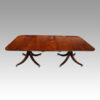 George V mahogany twin pillar dining table side view
