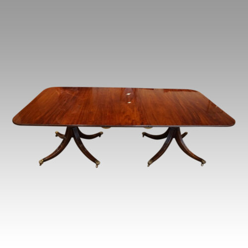 George V mahogany twin pillar dining table side view