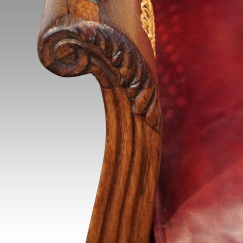 Regency library chair arm carving