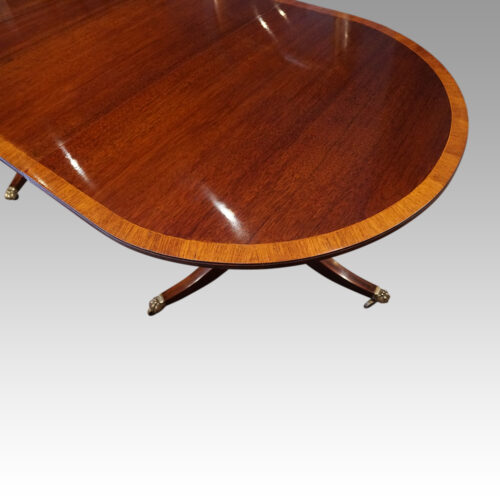 Regency style twin pillar dining table round end