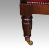 William IV mahogany library chair front leg