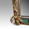 19thc. gilt pier mirror with eglomise glass panel corner