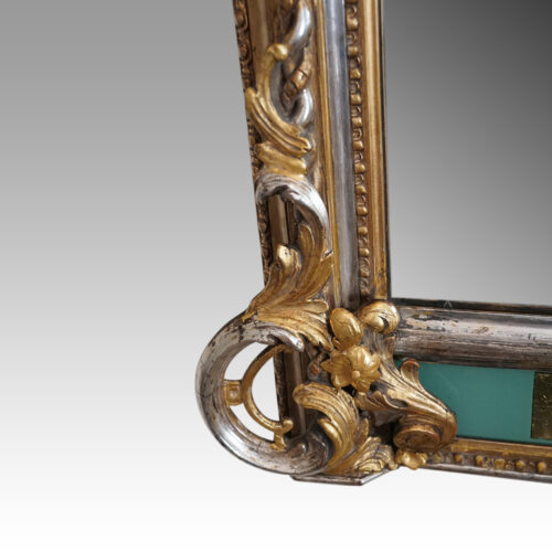 19thc. gilt pier mirror with eglomise glass panel corner