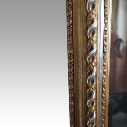 19thc. gilt pier mirror with eglomise glass panel running rope pattern