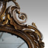 19thc. gilt pier mirror with eglomise glass panel shoulder detail