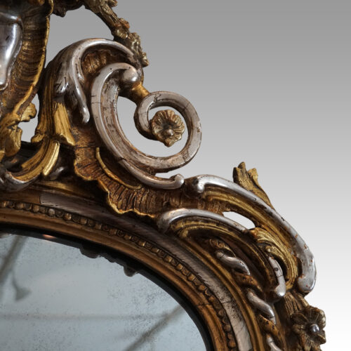19thc. gilt pier mirror with eglomise glass panel shoulder detail