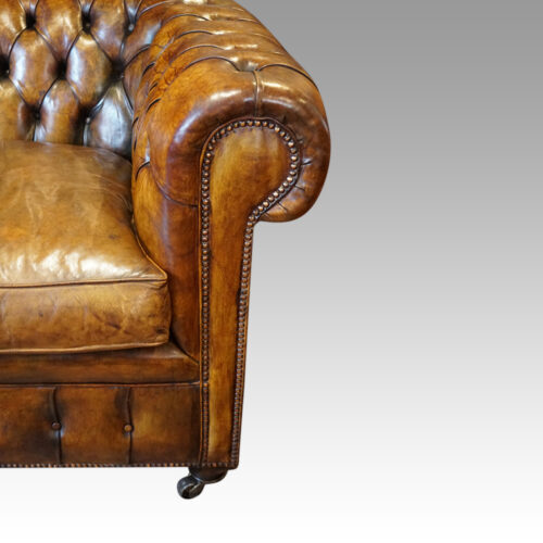 Leather button back 2 seat Chesterfield arm