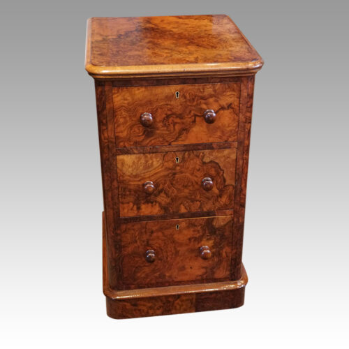 Pair of Victorian burr walnut bedside chests front detail