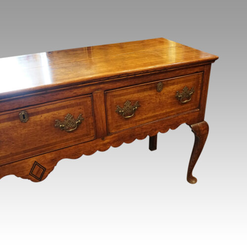 Georgian oak cabriole leg dresser base angle