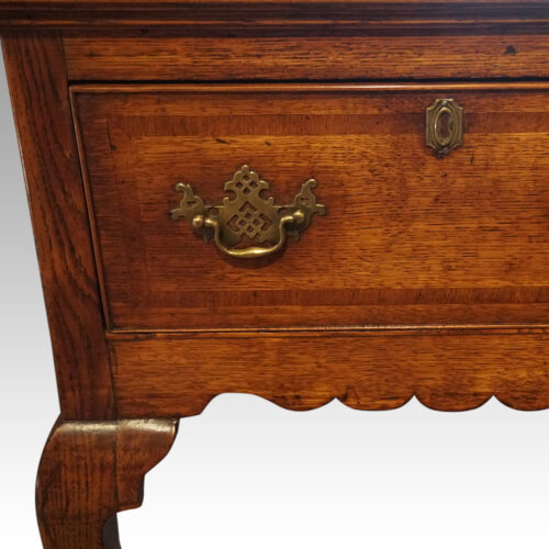 Georgian oak cabriole leg dresser base handle