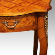 Matched pair of French side tables edge