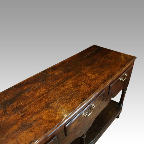 Antique oak rustic dresser base top angle