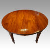 Edwardian circular extending dining table closed