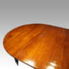 Edwardian circular extending dining table end