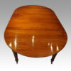 Edwardian circular extending dining table long view