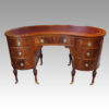 Edwardian inlaid mahogany kidney shaped desk front