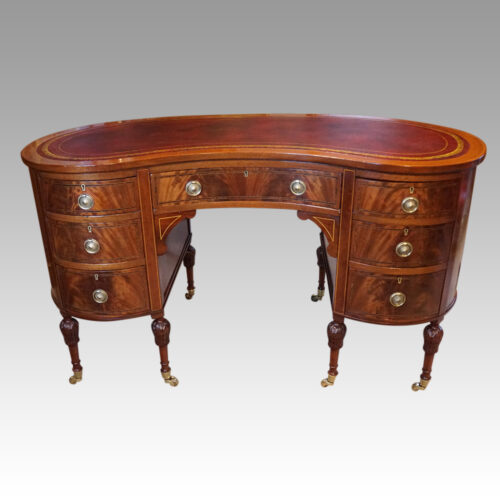 Edwardian inlaid mahogany kidney shaped desk front