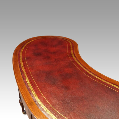 Edwardian inlaid mahogany kidney shaped desk top detail
