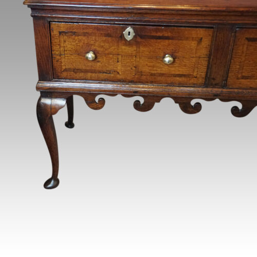 George III oak padfoot dresser base end leg