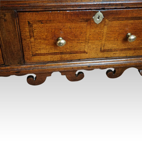 George III oak padfoot dresser base wave apron