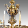 Pair of bronze chandeliers detail