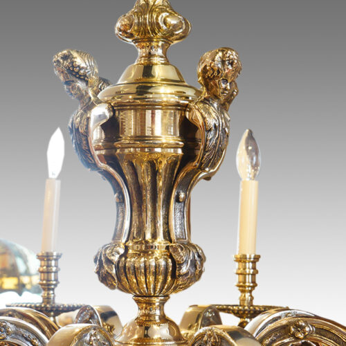Pair of bronze chandeliers detail