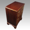 Pair of mahogany bedside chests angle