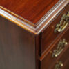 Pair of mahogany bedside chests corner