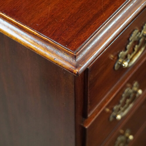 Pair of mahogany bedside chests corner