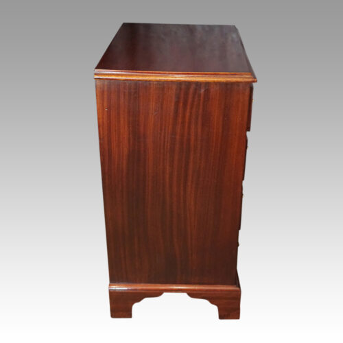 Pair of mahogany bedside chests side view