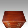 Pair of mahogany bedside chests top detail