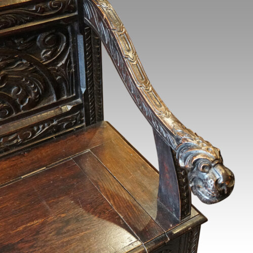 Victorian carved oak settle head