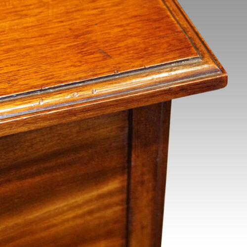 Victorian mahogany chest with bonnet cupboard corner