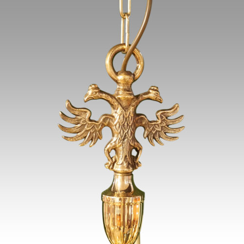 Dutch brass chandelier eagle mount detail