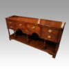 Georgian oak dresser base at angle