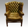 Georgian style leather button back wing chair