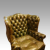 Georgian style leather button back wing chair angle back