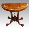 Victorian inlaid walnut demi-lune card table