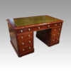 Victorian mahogany pedestal desk at angle