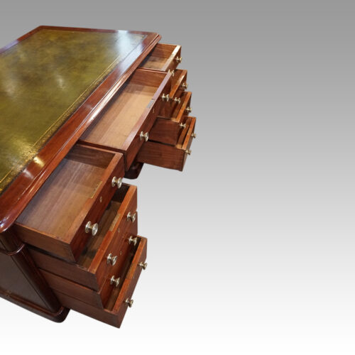 Victorian mahogany pedestal desk drawers open
