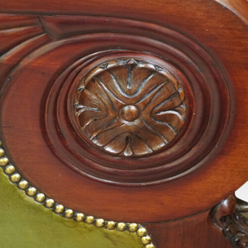 Antique leather library chair scroll arm