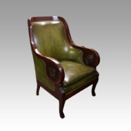 Antique mahogany library chair at angle