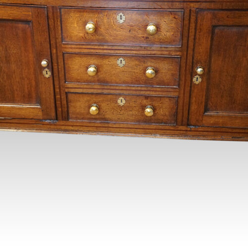 Antique oak cupboard dresser base central drawers