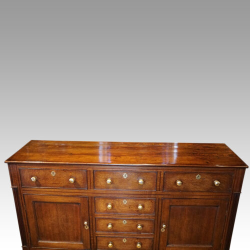 Antique oak cupboard dresser base top of front