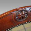 Pair of Victorian mahogany easy chairs carving detail
