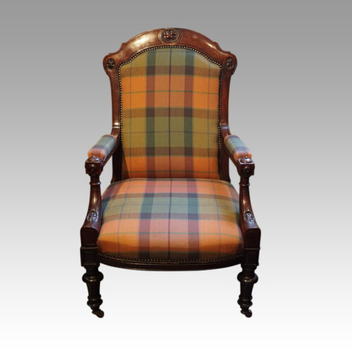 Pair of Victorian mahogany easy chairs front