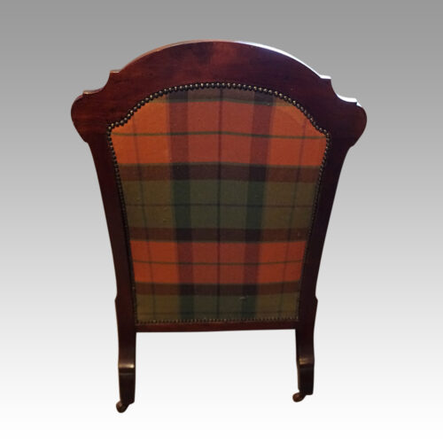 Pair of Victorian mahogany easy chairs rear