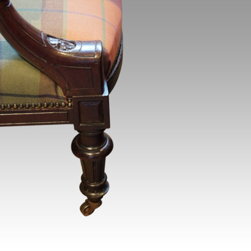 Pair of Victorian mahogany easy chairs side legs