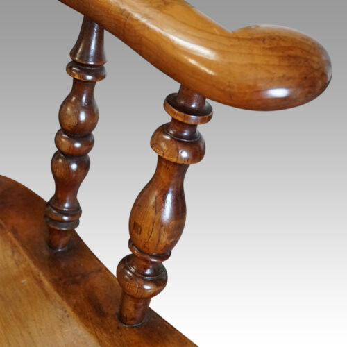 Pair of Yew wood Yorkshire broadarm chairs turned support