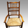 Set of 10 Lancashire spindle back chairs arm detail